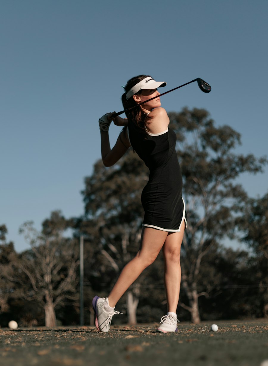 Golfer finishing a drive